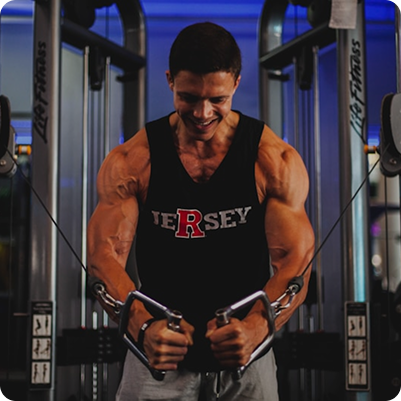 Man training with cable machine